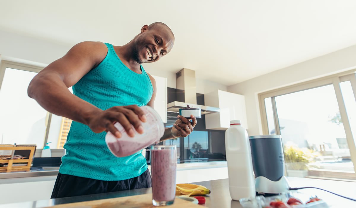 Man preparing breakfast in kitchen