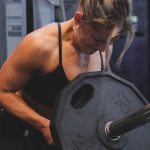 Person working at lifting a heavy weight